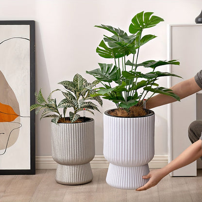 Pot de fleurs à réserve d'eau