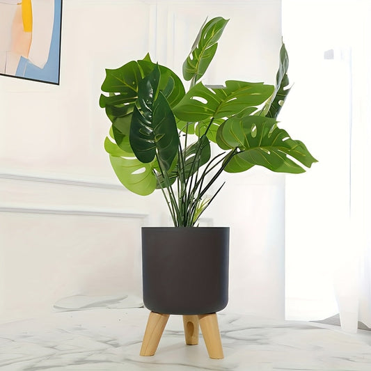 Pot de fleurs rond sur pieds de bois
